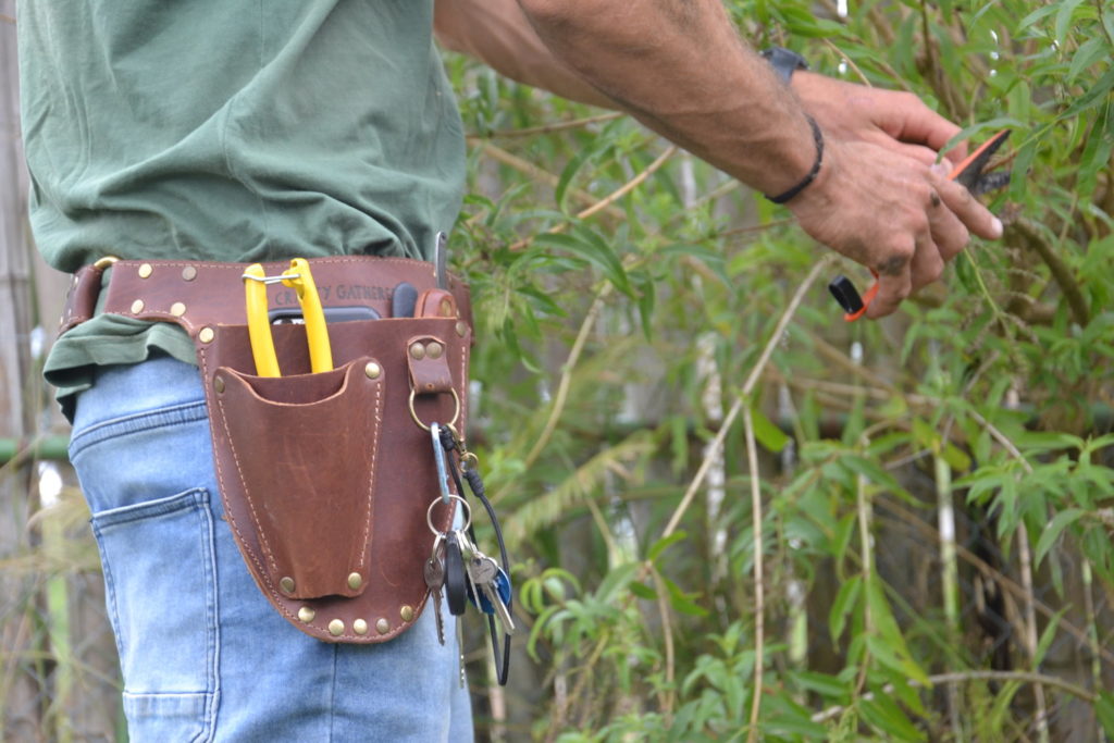 Add an asset for your bountiful garden by using the garden tool storage space.